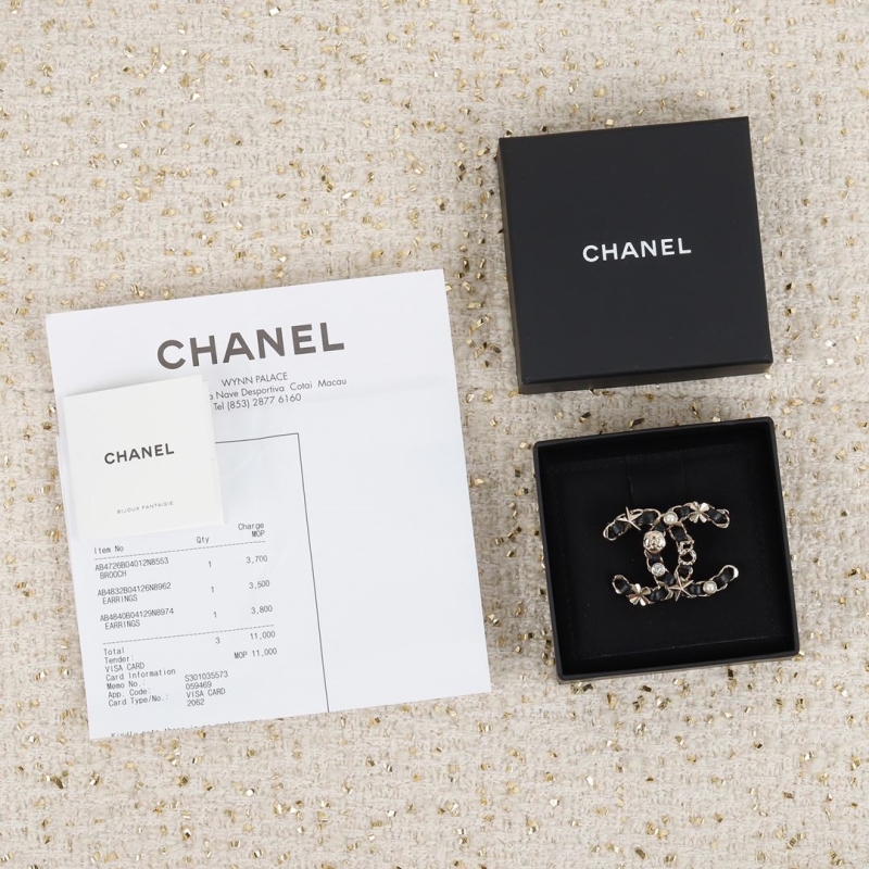 Ch*el brooches